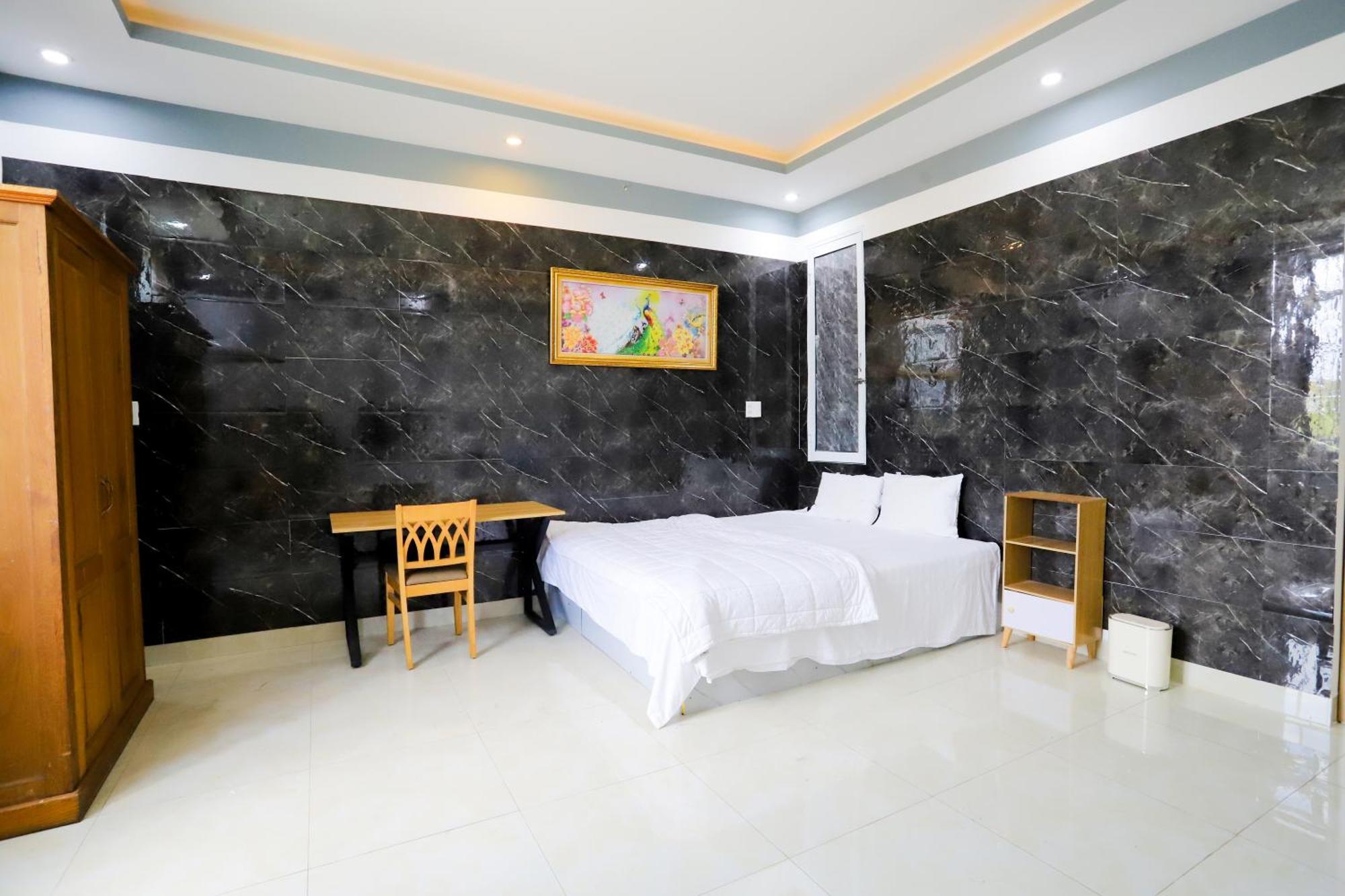 Hotel Tram Anh Nhon Trach Buitenkant foto